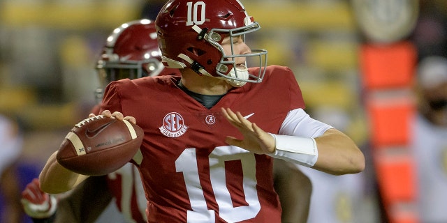 Alabama quarterback Mac Jones (10) throws during the first half of an NCAA college football game against LSU in Baton Rouge, La., Saturday, Dec. 5, 2020. (AP Photo/Matthew Hinton)