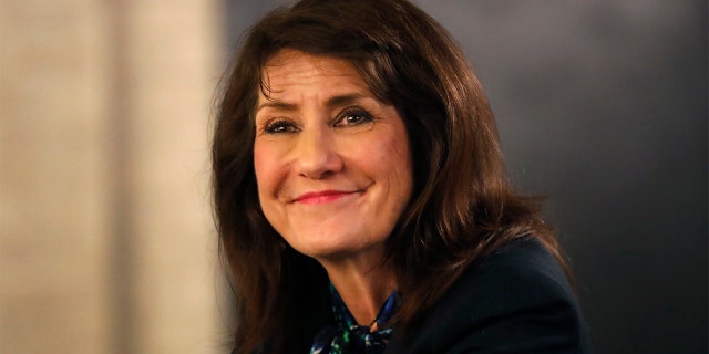 In this March 9 photo, Democrat Marie Newman campaigns in Chicago. Newman beat 3rd Illinois congressional district GOP candidate Mike Fricilone in the Nov. 3 general election. (AP Photo/Charles Rex Arbogast File)