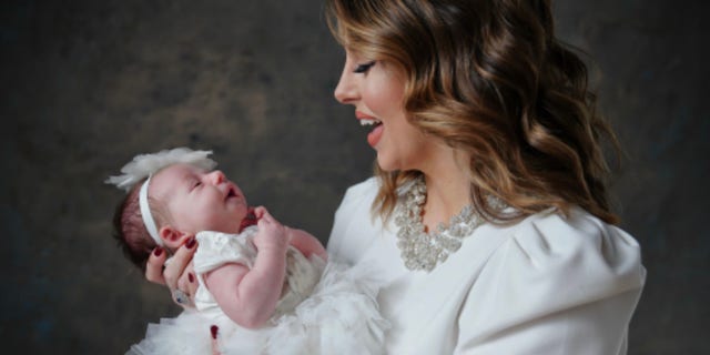 Morgan Ortagus and her daughter Adina. (Photo by Tony Powell)