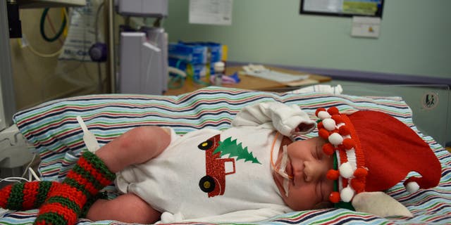 The day team helped get the costumes onto the babies.