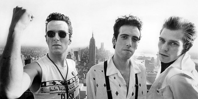 (L-R) Joe Strummer, Mick Jones and Paul Simonon of The Clash at Top of The Rock in New York City. This photo was taken by Bob Gruen in June 1981.