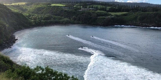 Nearby safety crews for a scheduled surfing competition responded to the incident, as seen in footage released by the Hawaii Department of Land and Natural Resources (DLNR).