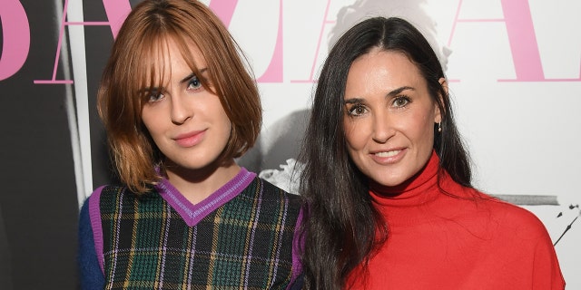 Tallulah Willis, left, said that her mother, Demi Moore, raised her to be "private." (Getty Images)