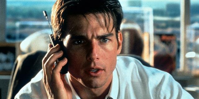 Tom Cruise talks on a phone in a scene from the film 'Jerry Maguire.' (Getty Images)