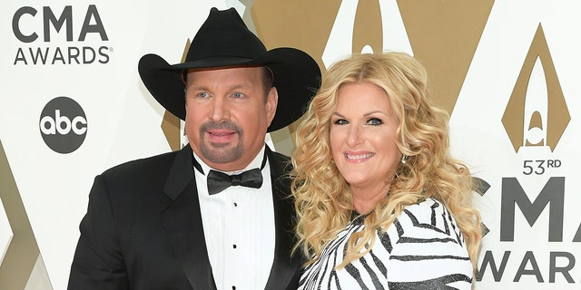 Garth Brooks and Trisha Yearwood took care of themselves in quarantine by singing together.  (Photo by Jason Kempin / Getty Images)