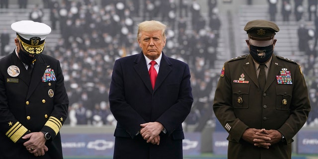 President Donald Trump stands on the field before the 121st Army-Navy Football Game in Michie Stadium at the United States Military Academy, Dec. 12, in West Point, N.Y. (AP Photo/Andrew Harnik)