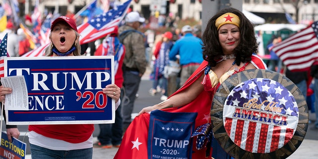 Supporters of US President Donald Trump demonstrate in Washington, DC, on December 12, 2020, to protest the 2020 election. (Photo by Jose Luis Magana / AFP) (Photo by JOSE LUIS MAGANA/AFP via Getty Images)