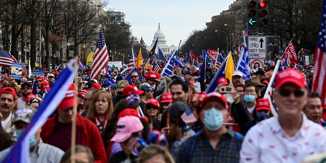 People gather on Pennsylvania Avenue for the "Stop the Steal" rally in support of U.S. President Donald Trump, in Washington, U.S., December 12, 2020. REUTERS/Erin Scott 