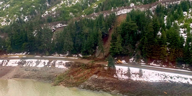Authorities have identified the two people missing after a landslide the width of two football fields slammed into the southeast Alaska community. (Lt. Erick Oredson/U.S. Coast Guard via AP)