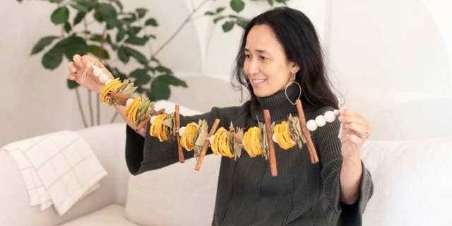 <a href="https://www.minted.com/" target="_blank">Minted’s</a> Founder Mariam Naficy makes homemade garlands in the cottagecore aesthetic for the holidays.