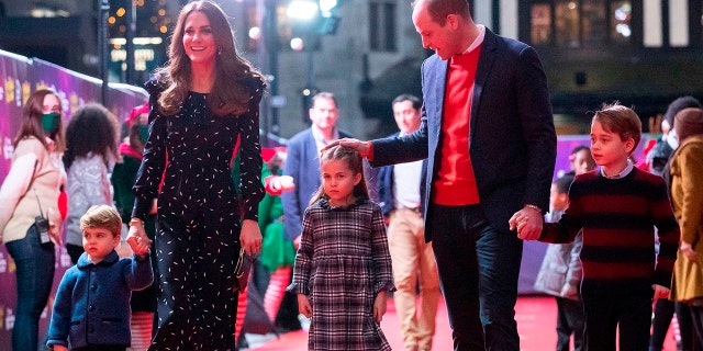 Prince William, Kate Middleton, and their children George, Charlotte and Louis. (Photo by Aaron Chown / POOL / AFP) (Photo by AARON CHOWN/POOL/AFP via Getty Images)