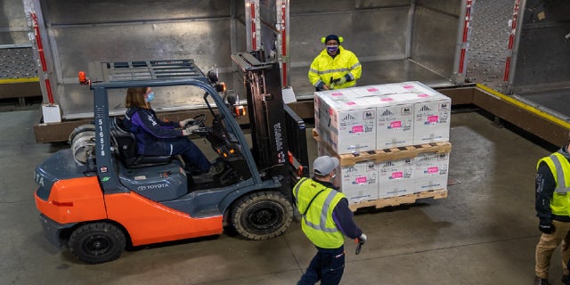FedEx workers transport vaccine doses in Grand Rapids, Mich. (FedEx)