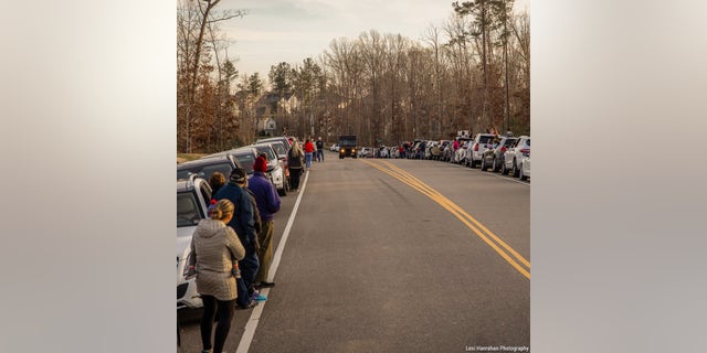 Hundreds of members of the community turned out to celebrate the delivery worker.