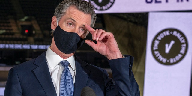 California Gov. Gavin Newsom speaks to reporters at Golden 1 Center in Sacramento, Calif. Gov. (Renée C. Byer/The Sacramento Bee via AP, Pool, File)