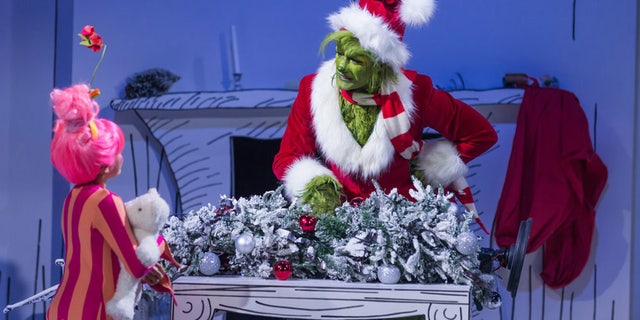 Pictured: (lr) Amelia Minto as Cindy Lou, Matthew Morrison as Grinch in NBC's Dr.  Suess 'The Grinch Musical!' 