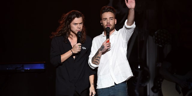 Harry Styles (L) and Liam Payne (R) of One Direction