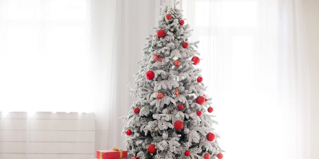 Christmas house interior with white Christmas tree