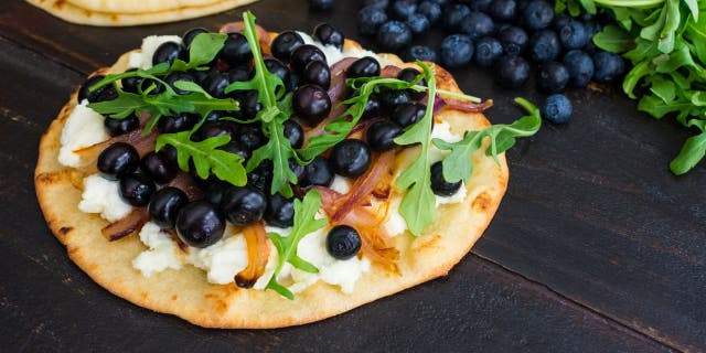 Blueberries are in season during the summer months, which also tends to be the time when blueberry pizza searches peak, according to data from Grubhub and Google Trends. (iStock)