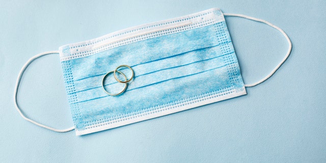 A wedding photographer says she tested positive for COVID-19 after being in a room for nearly two hours with an unexamined bride's party, where she learned that the bride positive, Texas Monthly said. (iStock)