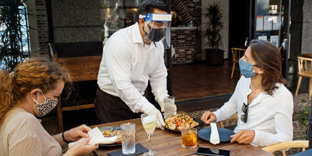 Restaurants are turning to empty hotel suites to offer guests safe, private indoor dining experiences during the pandemic and cold weather months. (iStock)