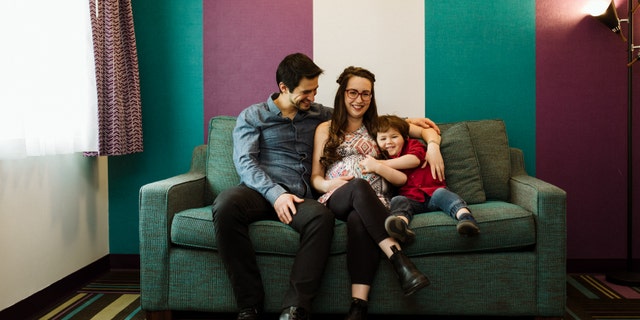 Nicole and Alexander Beshinsky won Hotel Zed's 'Nooner Baby Maker' promotional from Valentine's Day. The couple is pregnant with their second child. Their eldest son, Jackson, is pictured with them.