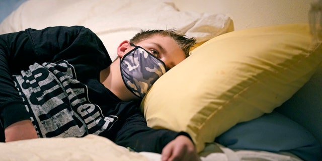 Cooper Wuthrich 12, became one of the hundreds of children in the U.S. diagnosed with a rare COVID-19 complication that landed him in an emergency room three hours away from his tiny hometown. (AP Photo/Rick Bowmer)