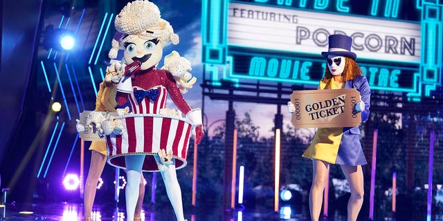 Taylor Dayne sprang from her Miss Popcorn costume.