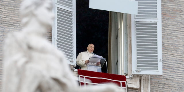 Pope Francis delivering a blessing over St.Peter's Square at the Vatican in December 2020.