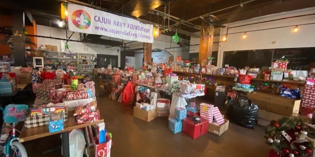 The Cajun Navy Headquarters quickly turns into Santa's workshop as they collect Christmas gifts for kids in need.