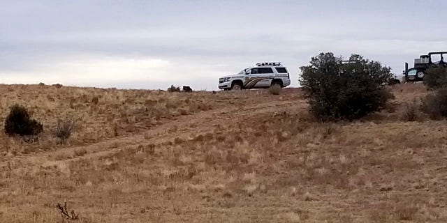 Authorities investigate the discovery of dozens of human body parts northwest of Prescott on Sunday. (Yavapai County Sheriff's Office via AP)
