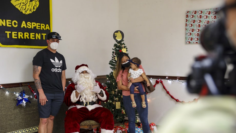 For more than 7 decades, US soldiers serve as 'Father Christmas' for periled orphans in Japan