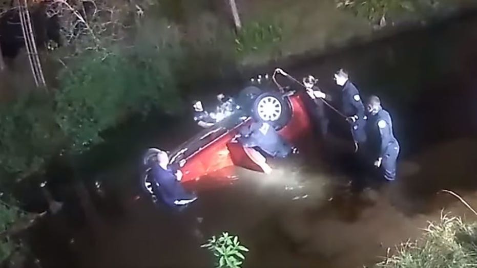 Florida family trapped inside overturned car in canal rescued by police,  firefighters and good Samaritan | Fox News