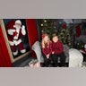 Elizabeth and William getting an unexpected visit from Santa.