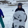 Siblings sledding at DeSales University in Center Valley, PA.