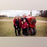 Good Morning, This is my family in our front yard with one of my husbands antique tractors he’s restored. Merry Christmas! Vanessa Seiler,