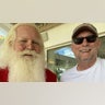 I was in Grand Cayman and ran into Santa who was on Holiday resting up for his big day. Santa allowed me to have my picture taken with him. Bill Troff