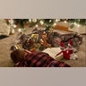 Chase Boyer of Ortonville, MI 4 years old admires the nativity under the tree