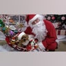 Greetings: This is a picture of our 4lb Yorkshire Terrier, Hairy Pawter in his sleigh that his daddy made with Santa. Hairy is a certified Therapy Dog. He goes to children's hospitals and nursing homes throughout the Chicagoland/Wisconsin area putting smiles on faces of all ages. Hairy has over 30 vehicles and costumes that he wears when he visits patients.