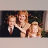 This is my favorite Christmas Picture. My 5 year old son would not smile and my 3 year old daughter was a little fed up with him. So, she decided to make him smile right as her daddy snapped the picture. This was taken in the 90's so we didn't see it until the pictures were developed. Photo taken by Larry Deese Lora Deese Fairmont, WV