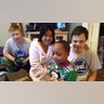 Our children opening gifts Christmas morning