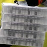 Boxes containing the Pfizer-BioNTech COVID-19 vaccine are prepared to be shipped at the Pfizer Global Supply Kalamazoo manufacturing plant in Portage, Mich., Sunday, Dec. 13, 2020.