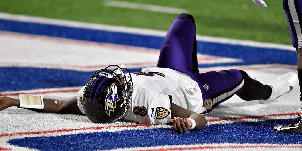 Ravens' Lamar Jackson hits head hard on turf, ruled out for rest of playoff game - Vimarsana News