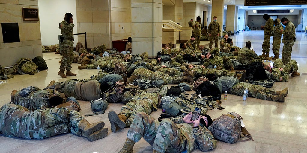 Early-morning Capitol photos show National Guard troops resting ahead of impeachment debate - Vimarsana News