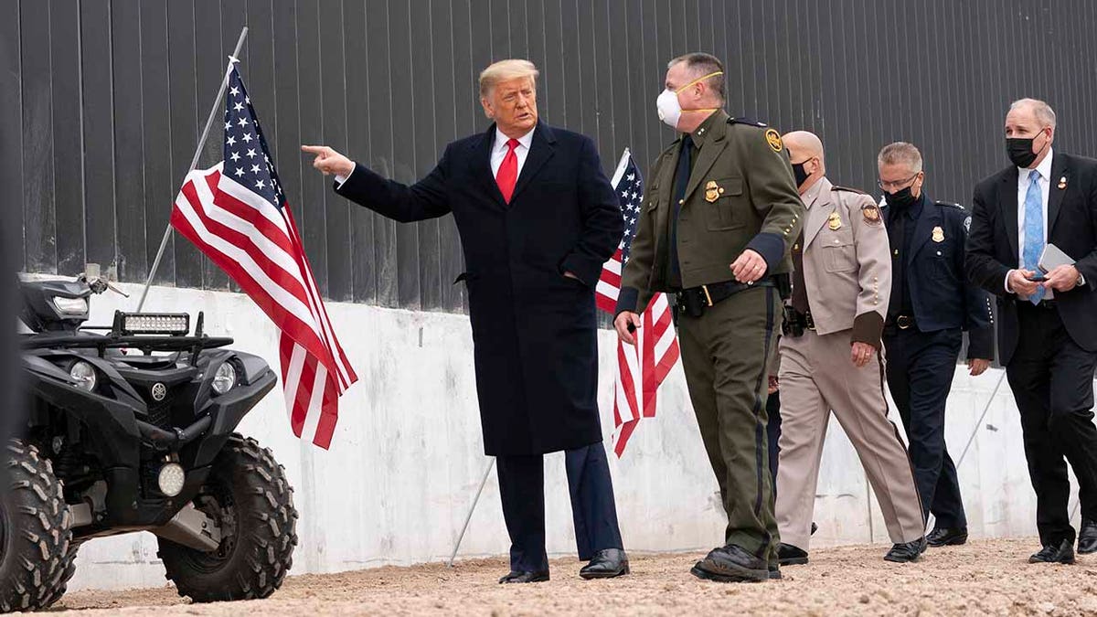 President Donald Trump tours a section of the U.S.-Mexico border wall, Tuesday, Jan. 12, 2021, in Alamo, Texas. (Associated Press)