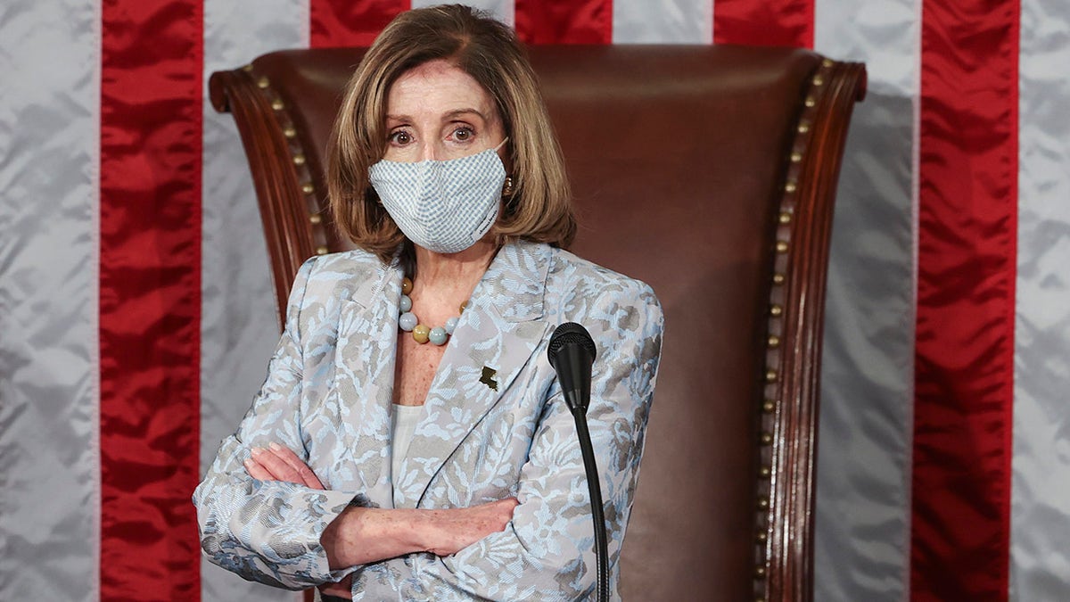 House Speaker Nancy Pelosi waits during votes during the first session of the 117th Congress at the U.S. Capitol in Washington, Sunday, Jan. 3, 2021. Pelosi said in December that she wants to overturn the Hyde Amendment. (Tasos Katopodis/Pool via AP)