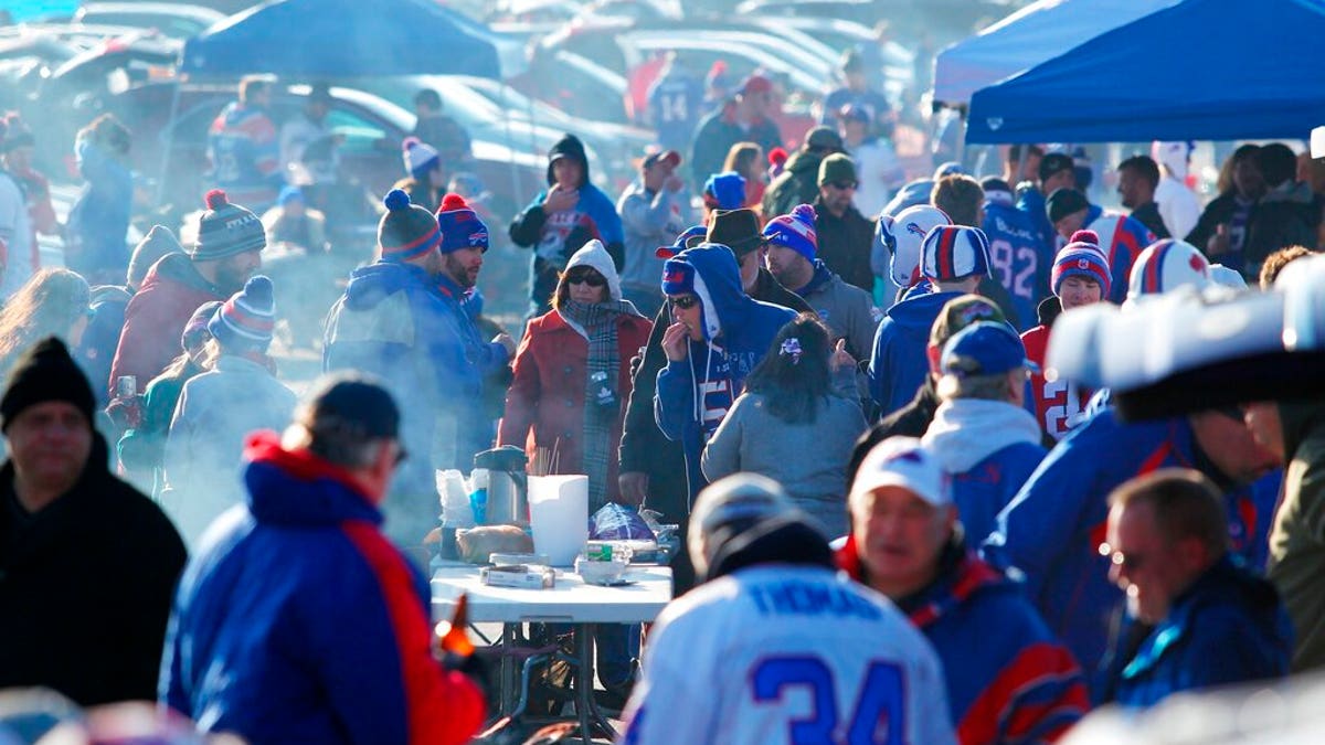 Fans arrive to tailgate before an NFL football game between the Buffalo Bills and the Jacksonville Jaguars in Orchard Park, N.Y., Nov. 27, 2016 photo.   (AP Photo/Bill Wippert, File)