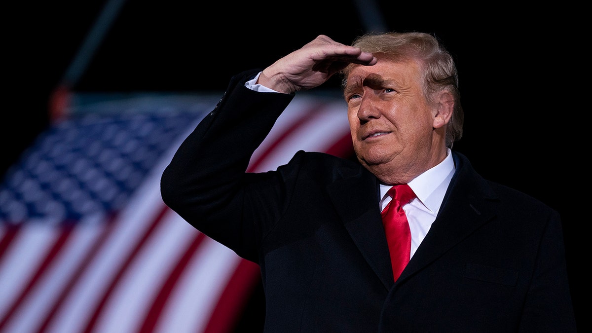 In this Monday, Jan. 4, 2021 file photo, President Donald Trump arrives to speak at a campaign rally for Sen. Kelly Loeffler, R-Ga., and David Perdue at Dalton Regional Airport, in Dalton, Ga.