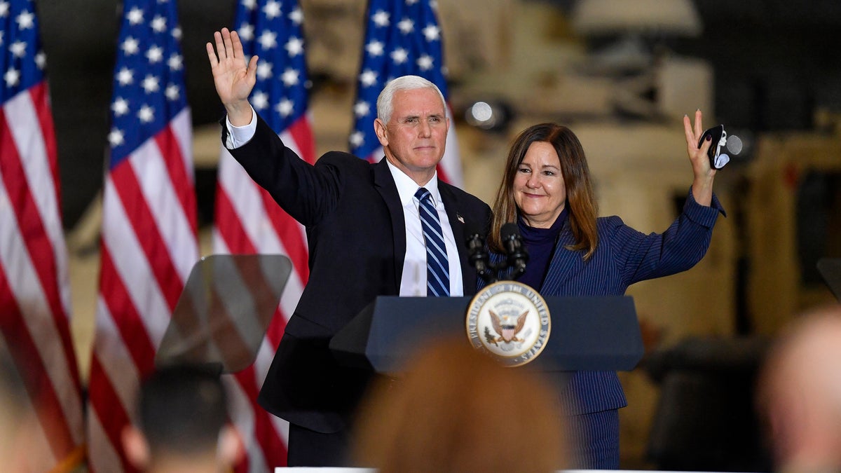 Vice President Mike Pence and second lady Karen Pence wave following remarks to Army 10th Mountain Division soldiers
