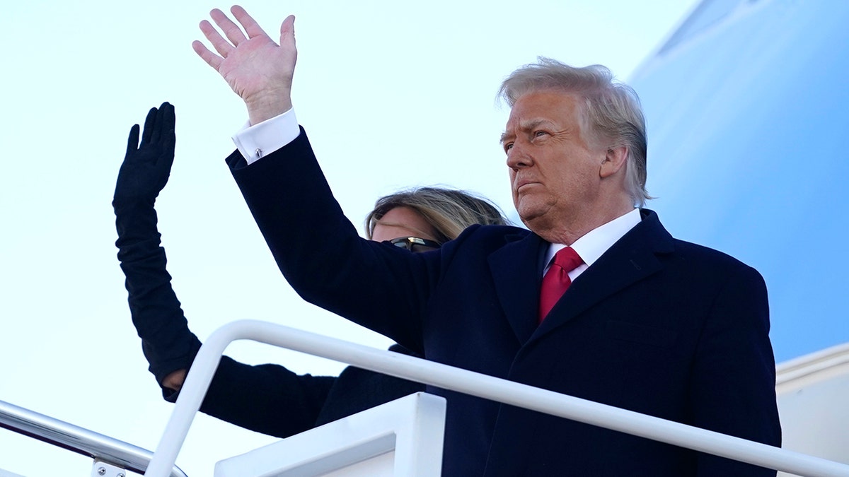 President Trump and first lady Melania Trump board Air Force One at Andrews Air Force Base, Maryland, Wednesday, Jan. 20, 2021.