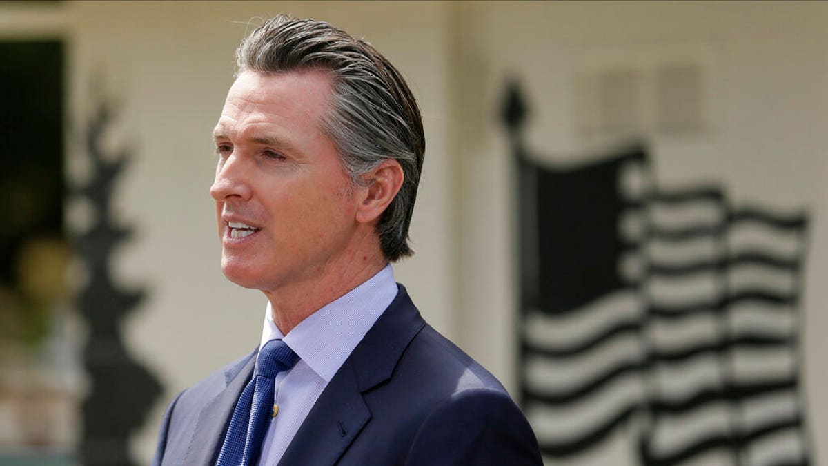 In this Friday, May 22, 2020, file photo, California Gov. Gavin Newsom speaks during a news conference at the Veterans Home of California in Yountville, Calif. (AP Photo/Eric Risberg, Pool, File)